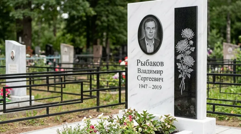 Памятник с гравировкой хризантем — выполненная работа «Рыбаков» в Ханты-Мансийске