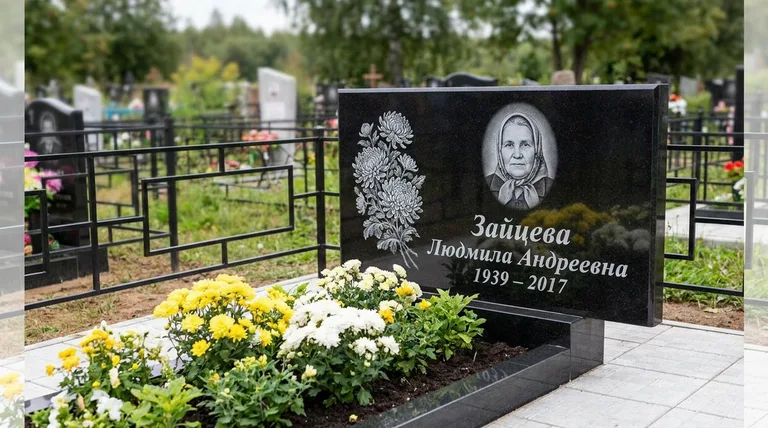 Памятник с гравировкой хризантем — выполненная работа «Зайцева» в Ханты-Мансийске